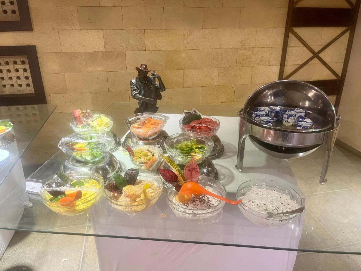 Panacea Suites Hotel Borg El Arab Esterno foto